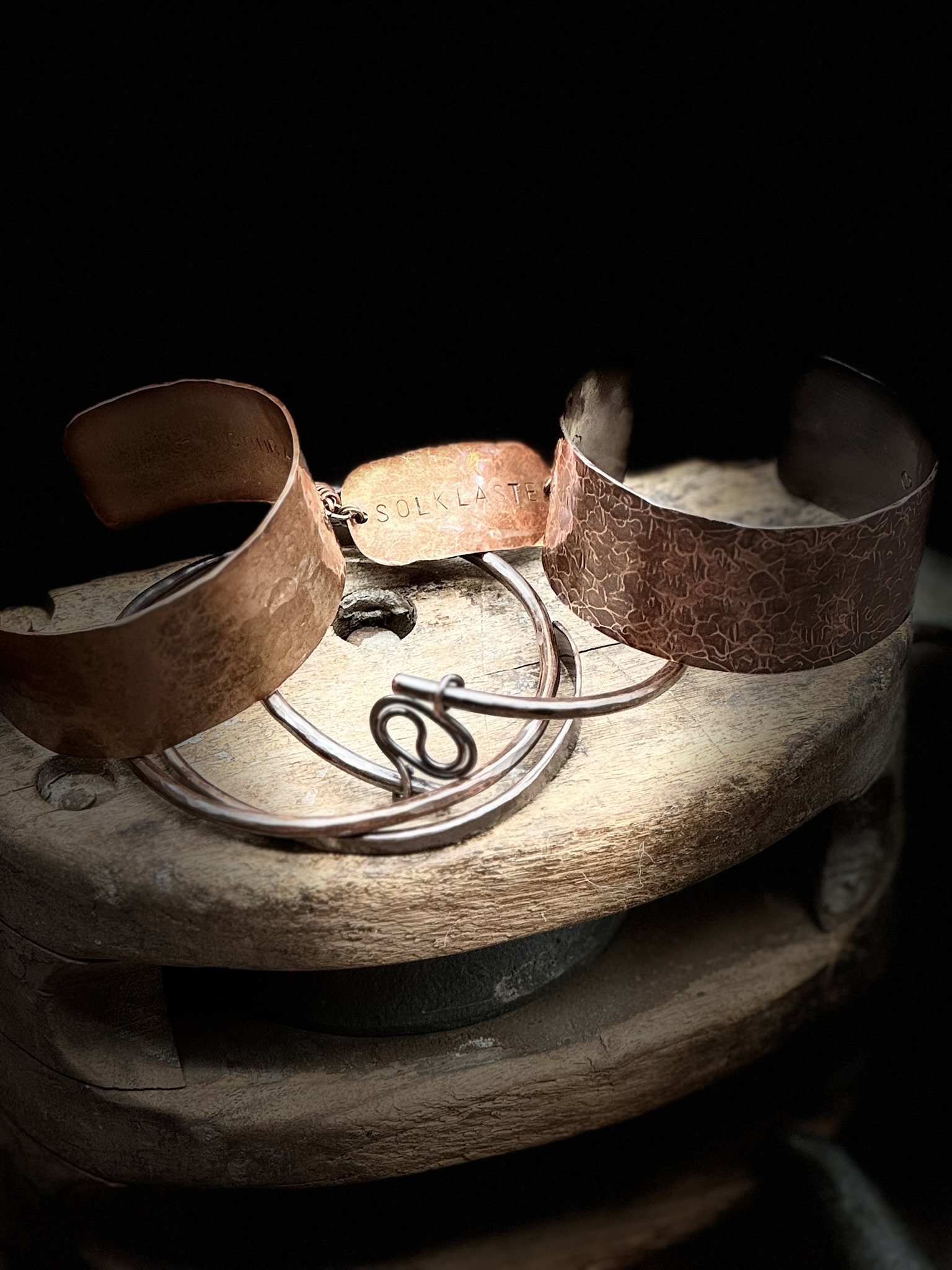Hammered copper cuffs stamped SOLKLASTE