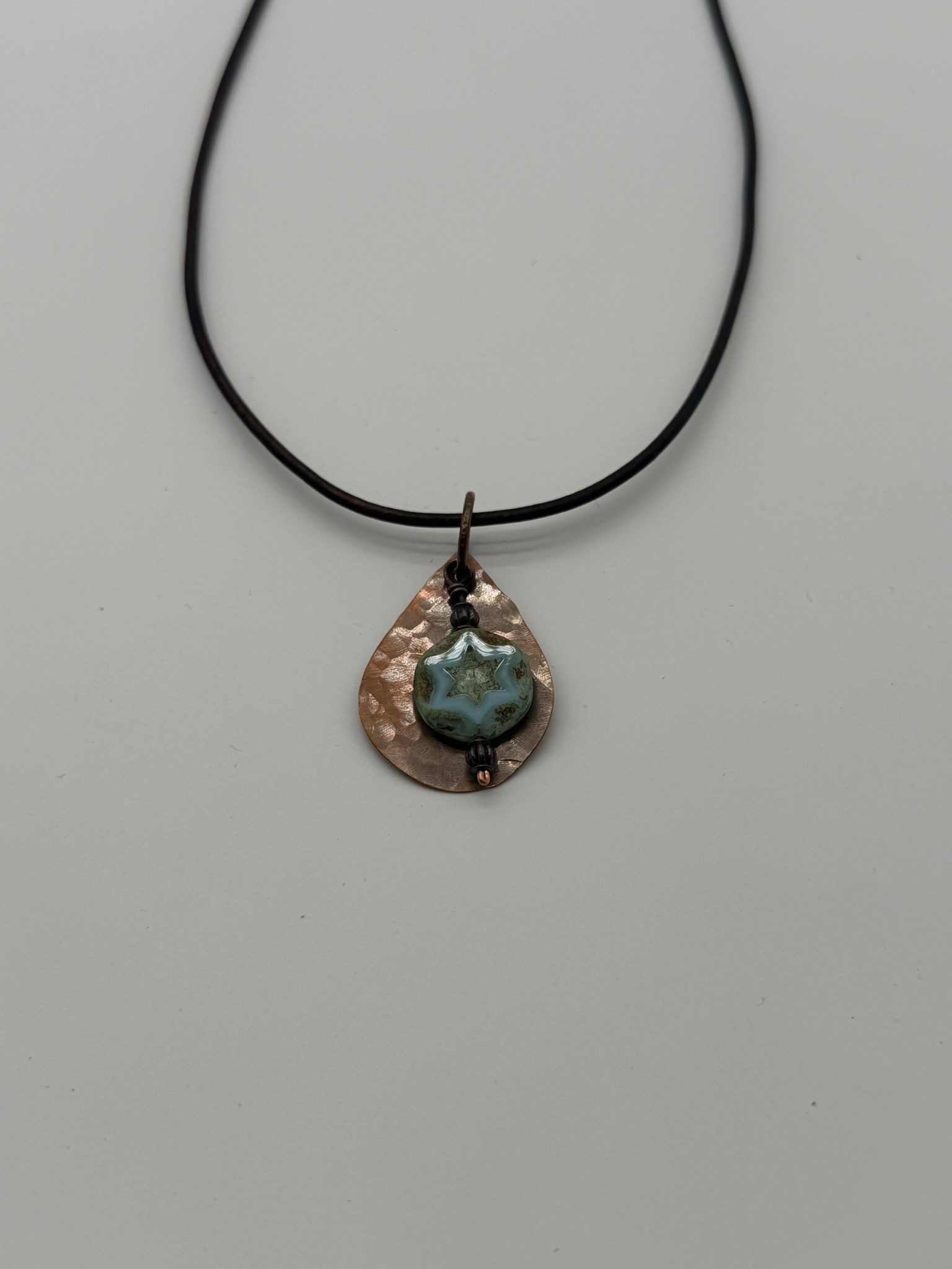 Copper teardrop pendant with turquoise
