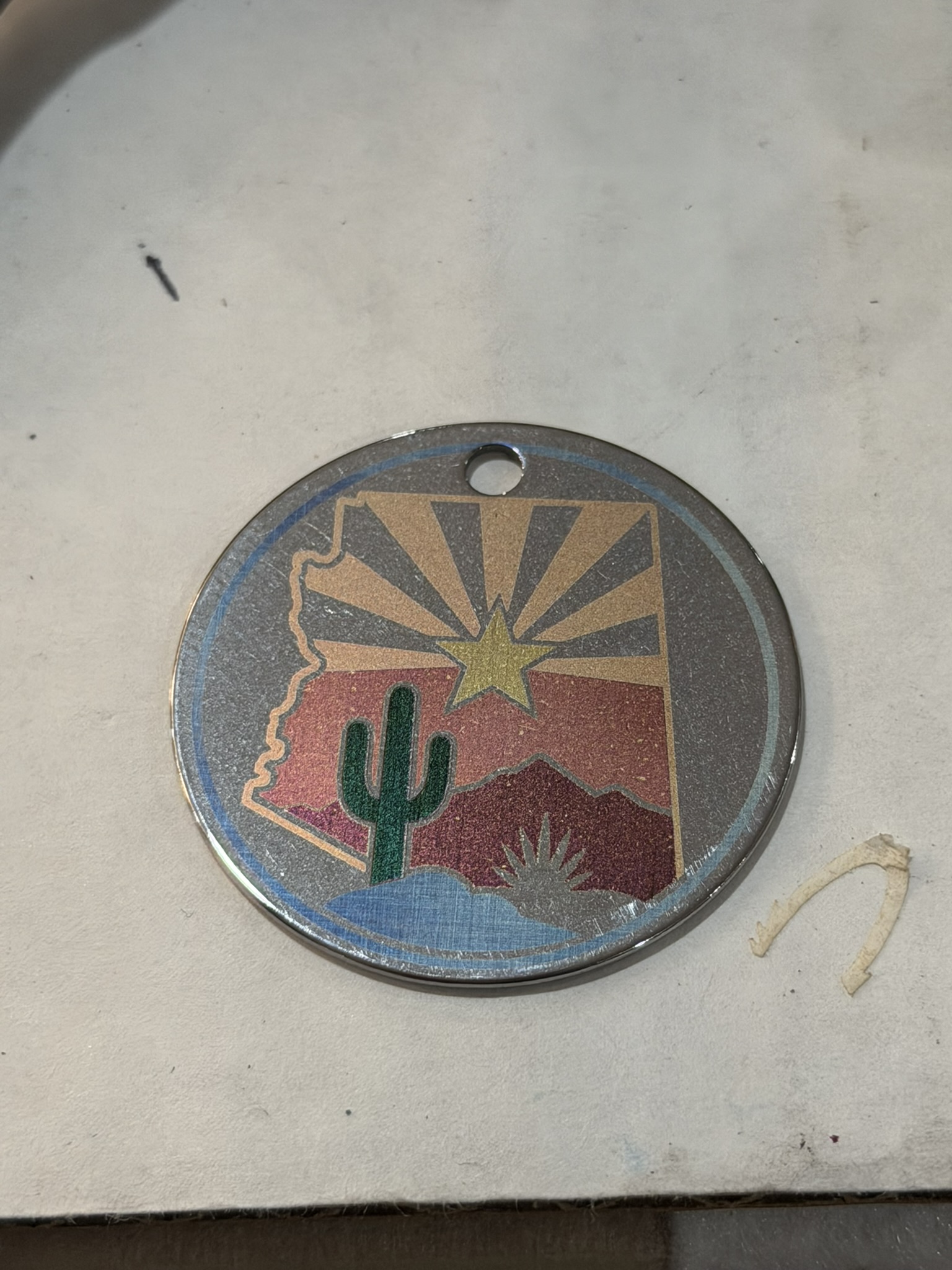 Arizona flag color medallion on steel